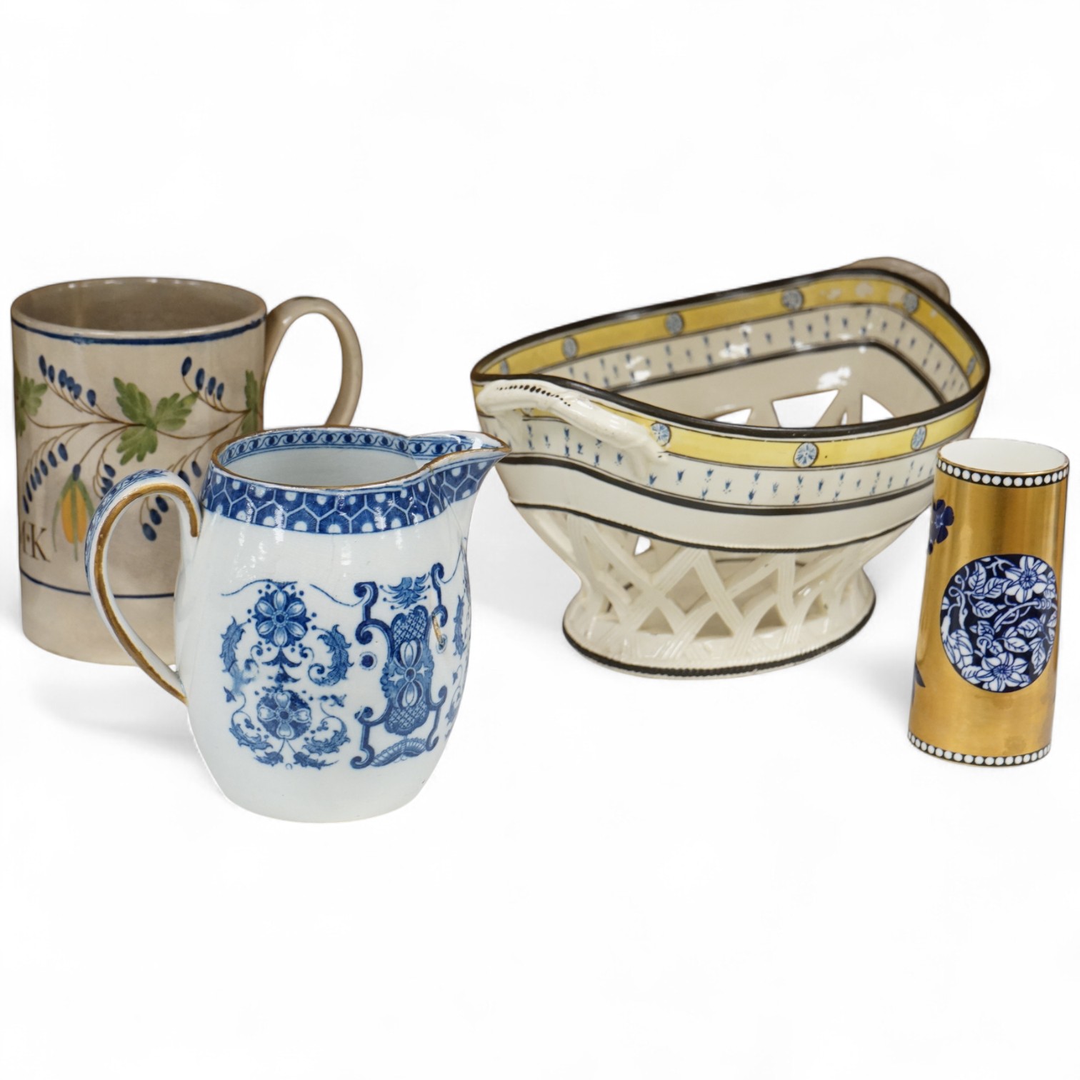 A George III creamware basket, a pearlware mug and jug, a Coalport spill vase (four), basket 26.5cm handle to handle.